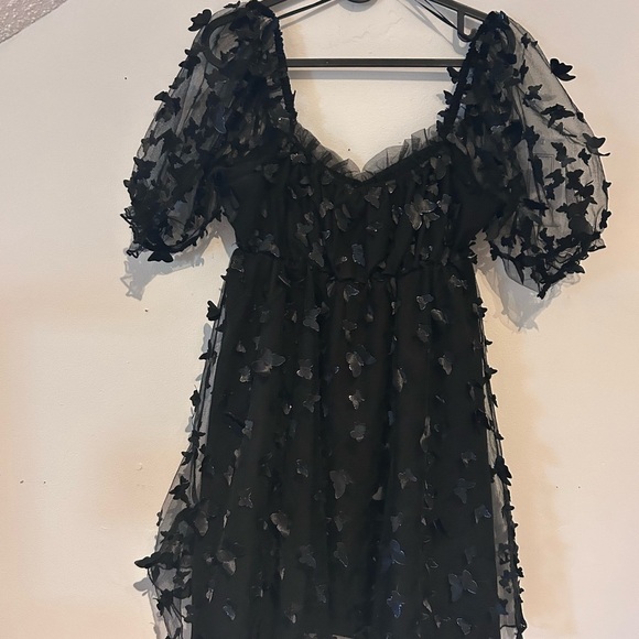 Chic Black Mini Dress with Butterfly Accents - Picture 4 of 6